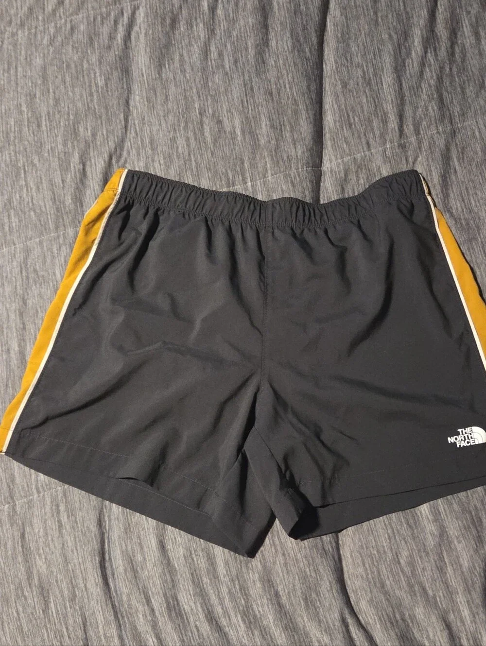 The North Face ELEVATION Black Athletic Shorts with Yellow Side Men Med.